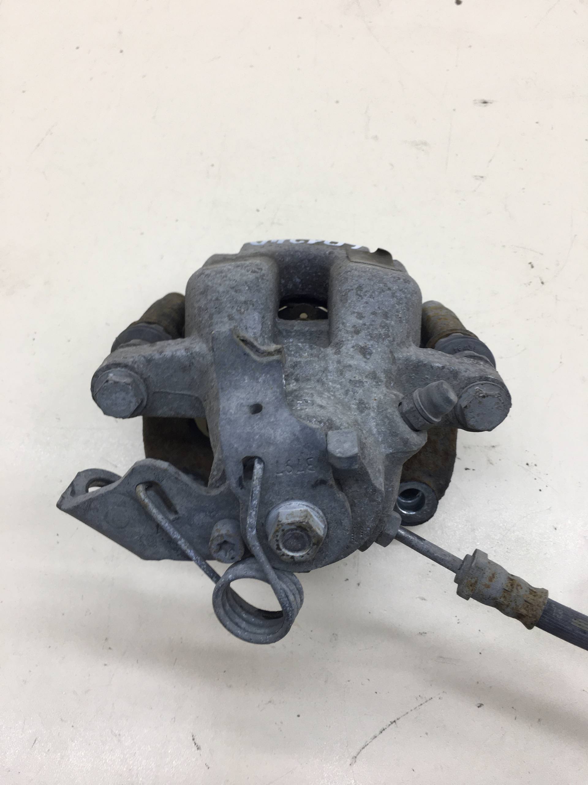 Суппорт задний левый Peugeot 208 2012>